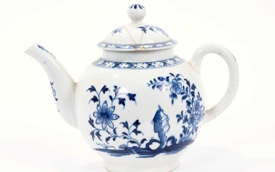 Lowestoft teapot, of globular form with a curved spout and button finial, painted in blue with flowers and rockwork within a diaper border, 13cm high