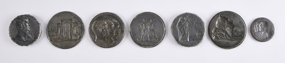 MATRICES FOR MEDALS.Set of seven pewter medal dies, representing the profiles of King Louis XVI, Queen Marie Antoinette, Madame Elizabeth, J. Baptiste Cant, Napoleon on his deathbed in St. Helena; in memory of the death of the Duc de Berry; of the...