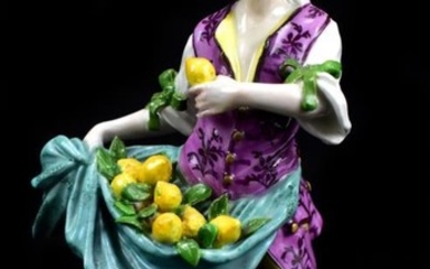 MEISSEN; a mid-18th century figure of a lemon seller...