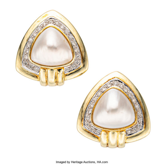 Mabe Pearl, Diamond, Gold Earrings The earrings feature mabe...