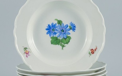 Meissen, Germany. Six deep plates of porcelain decorated with flowers.