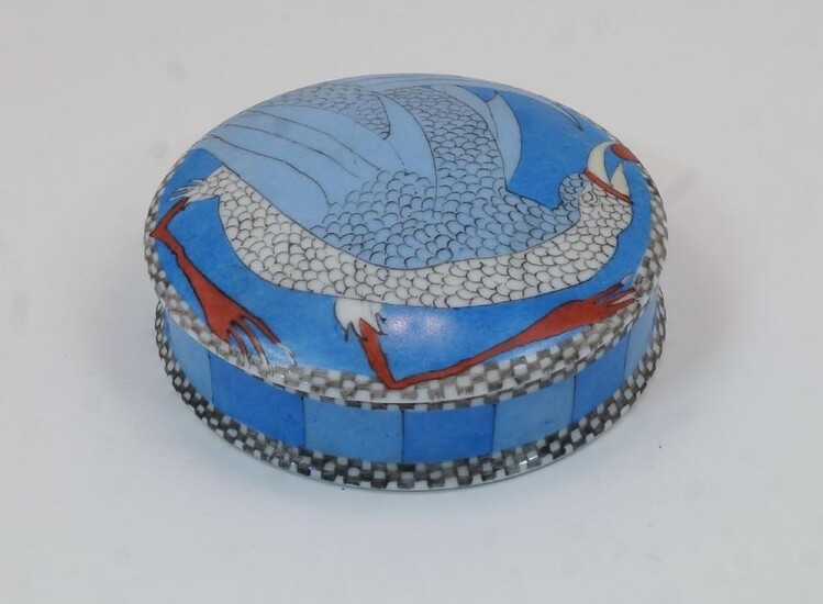 Melinda Patton for Limoges, a circular trinket box and cover, 20th century, of blue ground with decoration of a bird to the cover, with checkerboard rim to the box and cover, 11cm diameter