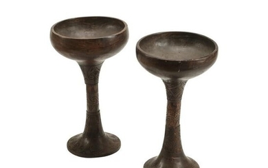 Pair of African Carved Wood Vessels.