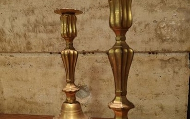 Pair of gilt torches with baluster shaft, contoured...