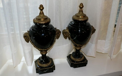Pair of marble and ormolu mounted urns.