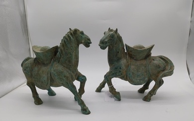 Pair of oriental bronze horses. {27 cm H x 30 cm W x 14 cm D...