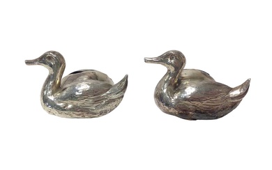 Pair of silver duck shaped menu holders