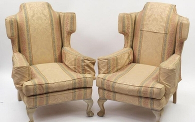 Pair of wingback armchairs with ball and claw feet and