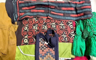 Quantity of burkhas, saris, and Bandhari fabric and clothing