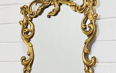 Rococo style gilt framed mirror (70 x 39cm)