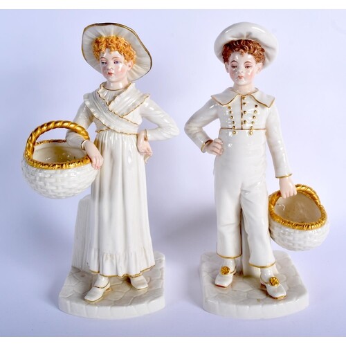 Royal Worcester Hadley style figure of a boy and girl with a...