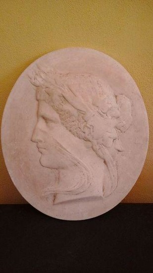 Sculpture of mythological profile