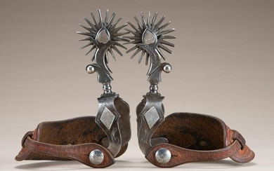 Showy pair of double mounted, hand engraved silver