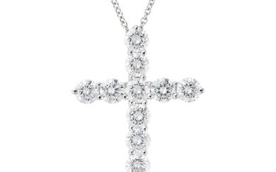 TIFFANY & CO., A DIAMOND CROSS PENDANT NECKLACE in platinum, the pendant designed as a cross set