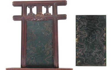 TWO CHINESE CARVED AND GILDED JADE PLAQUES, QING DYNASTY Plaques approx.: 4 5/8 x 7 5/8 in.