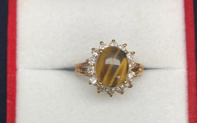 Tiger Eye Gemstone Ring Encased in Triangular Austrian Crystals on and 18KTGP Band.