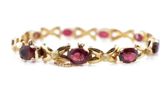 Tourmaline and 18ct yellow gold bracelet with approx nine 8x...