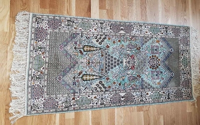 Tunesian silk carpet, design with flower vase upon light-coloured background. Late 20th century/early 21st century. 147×73 cm.