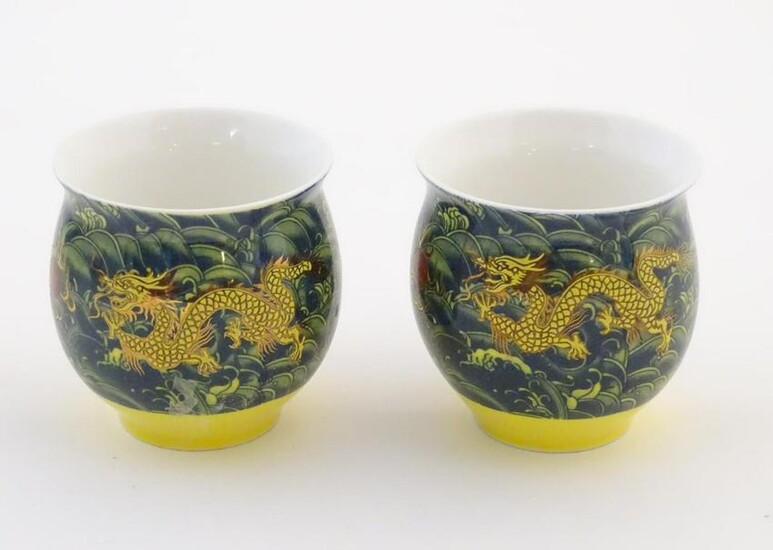 Two Chinese tea bowls of bulbous form with flared rims