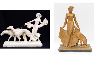 Two early 20th Century plaster figures of ladies with hunting...