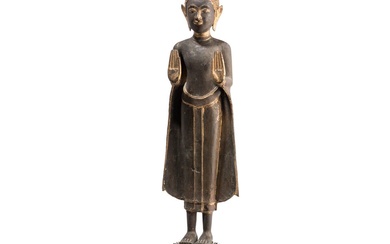 Un bouddha thaï debout en bronze, 19e siècle Bronze avec traces de dorure à la...