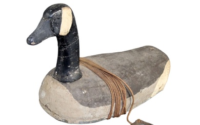 Vintage duck decoy with rope and weight