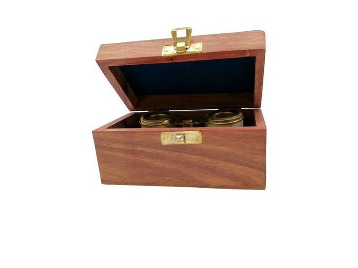 Vintage opera glasses in wooden box