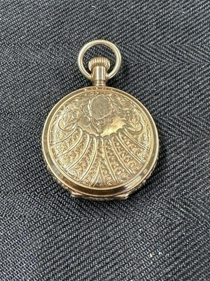 Waltham 14K ladies closed face pocket watch, ( O ) size, fancy engraved covers, not running, from