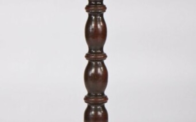 William & Mary oak candle stand, circa 1690, the octagonal top above a turned pillar and shaped