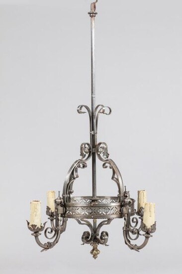 Wrought iron chandelier with 4 lights and neo-gothic decor. Early...
