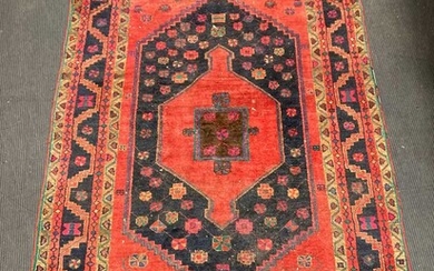 a hamadan red ground rug, 227 x 154cm