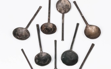 Eight Pewter and One Latten Early Round-bowl Spoons, 17th century, with straight handles, most of the pewter spoons with rose and crown