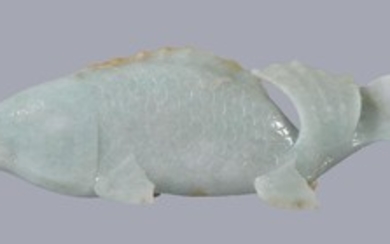 A Chinese jadeite celadon carving of a fish