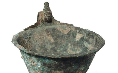 An attractive Roman bronze handled bowl