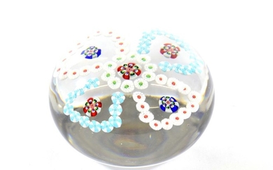 A Baccarat Patterned Millefiori Paperweight, circa 1850, with central canes...