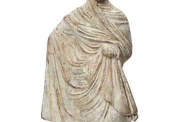 A Greek terracotta figure of a woman,...