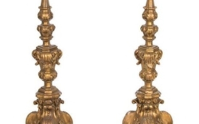 A Pair of Italian Rococo Style Painted and Parcel Gilt Torchere Stands