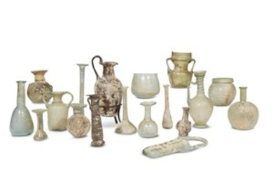 A large collection of Roman glass vessels and unguentaria...
