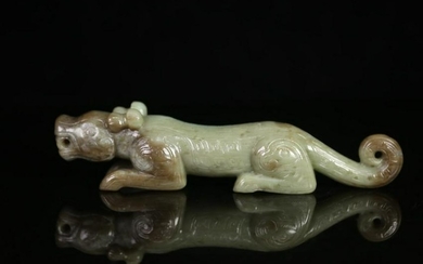 AN OLD JADE TIGER ORNAMENT