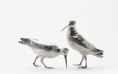A pair of silver table-pieces shaped as a woodcock