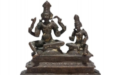 A South Indian figure of Shiva and...