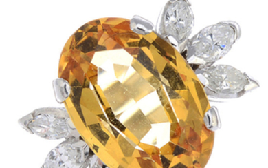 A yellow topaz and diamond cocktail ring.