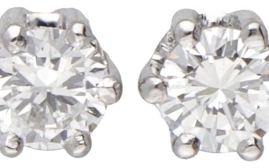 14K. White gold solitaire earrings set with approx. 0.40 ct. diamond.