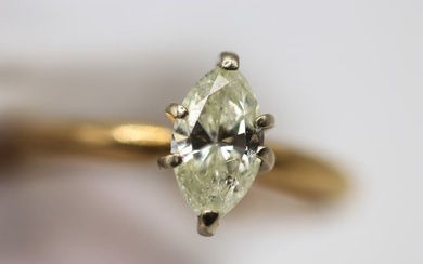 14K Yellow Gold Solitaire ring, with Faint Yellow Marquise cut diamond center stone, with sizing