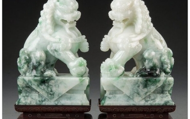 25014: A Pair of Chinese Jadeite Fu Lion Figures, 20th