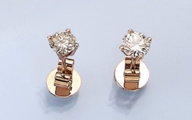 Pair of 14 kt gold earrings with...