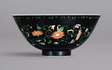 AN EXCEPTIONAL AND RARE BLACK-GROUND FAMILLE-VERTE 'CHRYSANTHEMUM' BOWL MARK AND PERIOD OF YONGZHENG