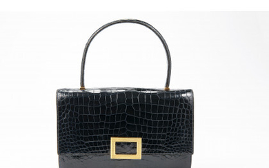 HERMÈS Blue crocodile leather handbag with rectangular clasp (cm 24)...