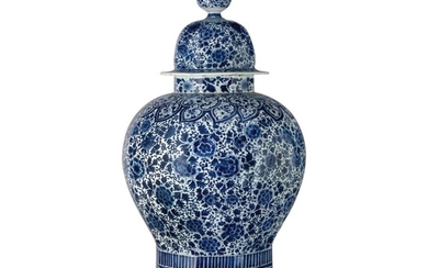 A DUTCH DELFT BLUE AND WHITE LARGE OCTAGONAL BALUSTER VASE AND COVER, CIRCA 1700