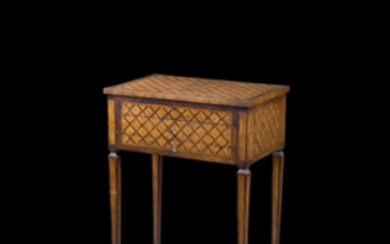 A marquetry inlaid work table. 19th century (cm 62x80x42)